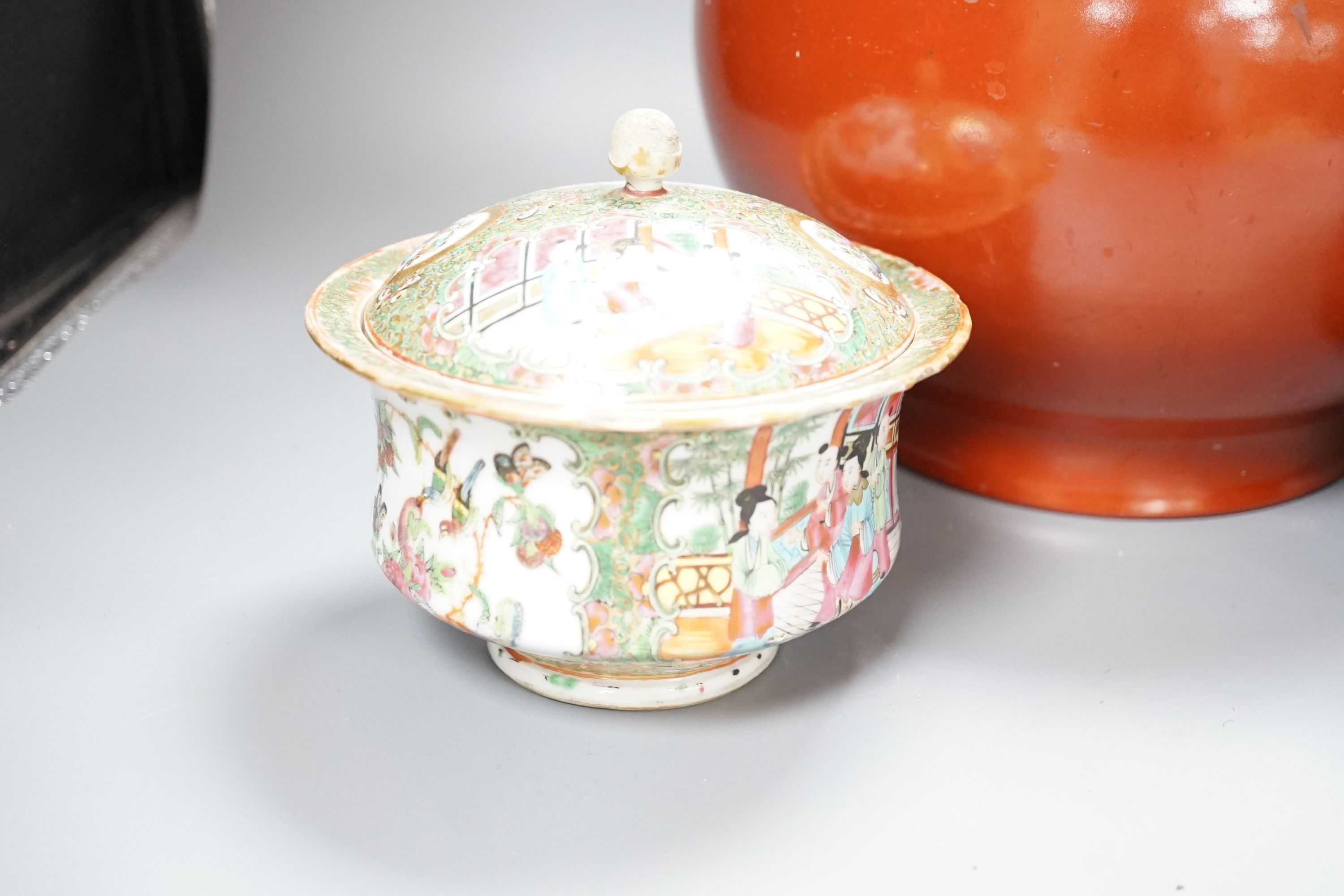 A 19th century Chinese famille rose pot and cover, 15cm diam., together with a decorative Chinese jug and large monochrome china pot